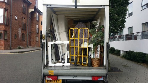Properly filled and organized skip for construction waste