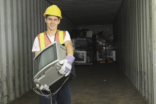 First aid kit and spill control equipment beside a skip